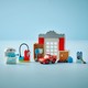 LEGO® DUPLO® 10456 - McQueen látogatása Doki garázsában