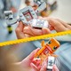 LEGO® Pokémon 72157 - SMART Play™: Charmander és Geodude összecsapása a barlangban