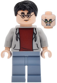 Harry Potter sötét kékesszürke  pulóverben, megszállott arccal