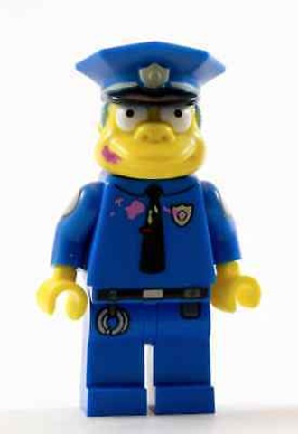 LEGO® Minifigurák sim023 - Wiggum Rendőrfőnök Cukormázzal az Arcán és a Ruháján