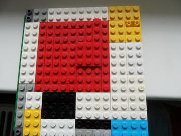 Piet Mondrian :Kompozíció sárgával vörössel feketével
